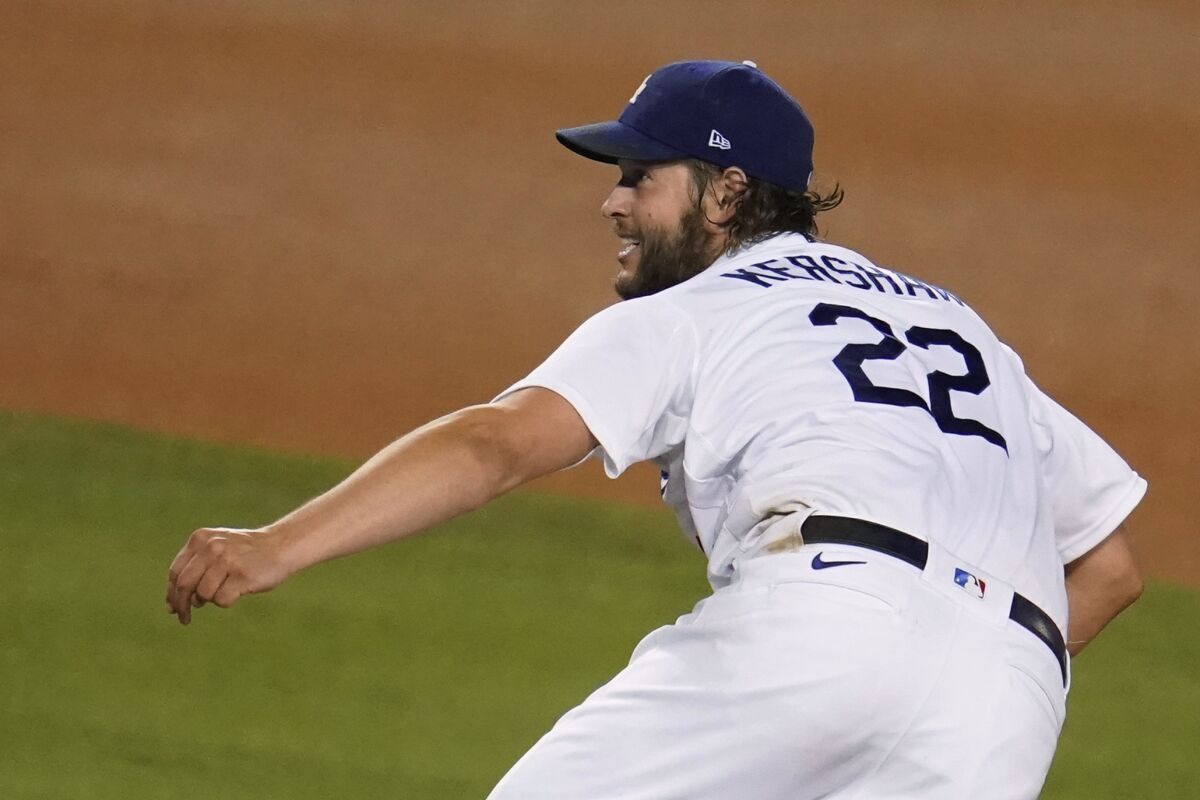 Los Angeles Dodgers starting pitcher Clayton Kershaw follows through on a pitch during the sixth inning of the team's baseball game against the Arizona Diamondbacks on Thursday, Sept. 3, 2020, in Los Angeles. (AP Photo/Marcio Jose Sanchez)