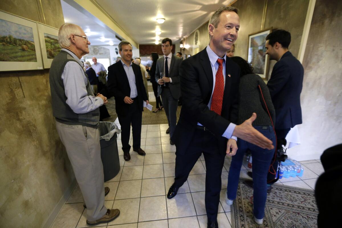 Former Maryland Gov. Martin O'Malley greets people before an April fundraiser in Iowa, where he has spent months trying to win early support ahead of the nation's first presidential caucus.