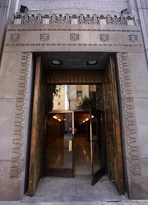 The art deco-influenced entrance to Versus, a large three-story night club about to open in downtown Los Angeles, faces Spring Street and dates to the early 1930s. The building was originally the headquarters of the Pacific Stock Exchange/Los Angeles Stock Exchange building. The heavy brass doors that face Spring Street are original.
