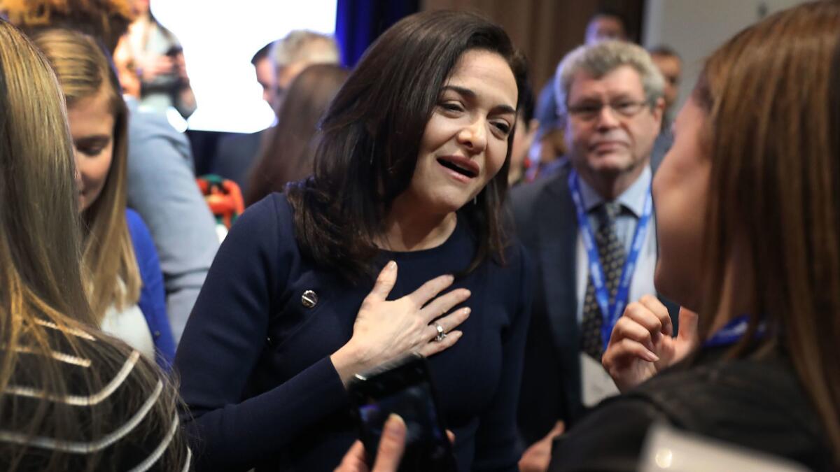 There are signs that Facebook COO Sheryl Sandberg's reputation is on the mend. Above, Sandberg talks during a Facebook event in Miami last December.