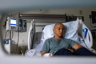 Los Angeles, CA - January 16, 2024: Arthur Yu has a rare form of leukemia and is being treated at Cedars-Sinai in Los Angeles, CA, on January 16, 2024. His cousin from the Philippines is a stem cell match, but the U.S. government has denied his entry into the country twice. A stem cell transplant would greatly increase Yu's chance to fight his leukemia, but now he will have to undergo chemotherapy. He asked that a photographer call him to arrange a time around his schedule because starting on the week of Jan. 15 he will have to undergo chemotherapy treatment. (Francine Orr/ Los Angeles Times)