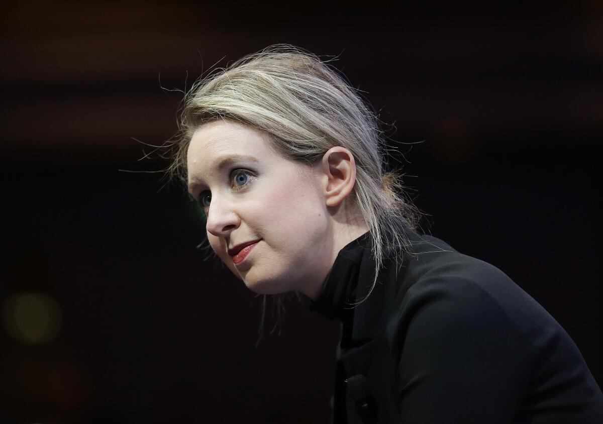 FILE - In this Nov. 2, 2015, file photo, Elizabeth Holmes, founder and CEO of Theranos, speaks at the Fortune Global Forum in San Francisco. Just six years ago, Holmes seemed destined to fulfill her dream of becoming Silicon Valley's next superstar. Now she is about to head into a San Jose, Calif., courtroom to defend herself against criminal allegations depicting her as the devious mastermind of a fraud that duped wealthy investors, former U.S. government officials and patients whose lives were endangered by a blood-testing technology that never came close to fulfilling her bold promises. (AP Photo/Jeff Chiu, File)