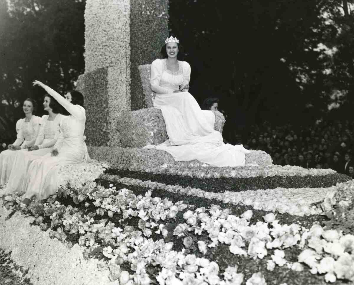This photo provided by the Pasadena Tournament of Roses shows Margaret Huntley Main riding the parade float as the Rose Queen for the Pasadena Tournament of Roses in 1940. Margaret Huntley Main, the 1940 Tournament of Roses queen and the oldest living titleholder, died last Friday, Nov. 24, 2023, in Auburn, Calif., the Tournament of Roses said in a statement Tuesday, Nov. 28. She was 102. (Pasadena Tournament of Roses via AP)