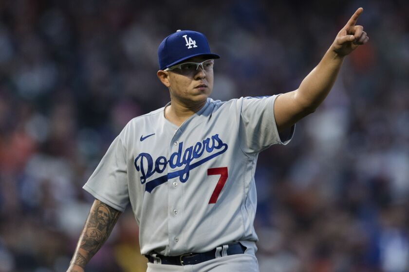 Dodgers starter Julio Urías gestures at the end of the third inning Sept. 4, 2021, in San Francisco.