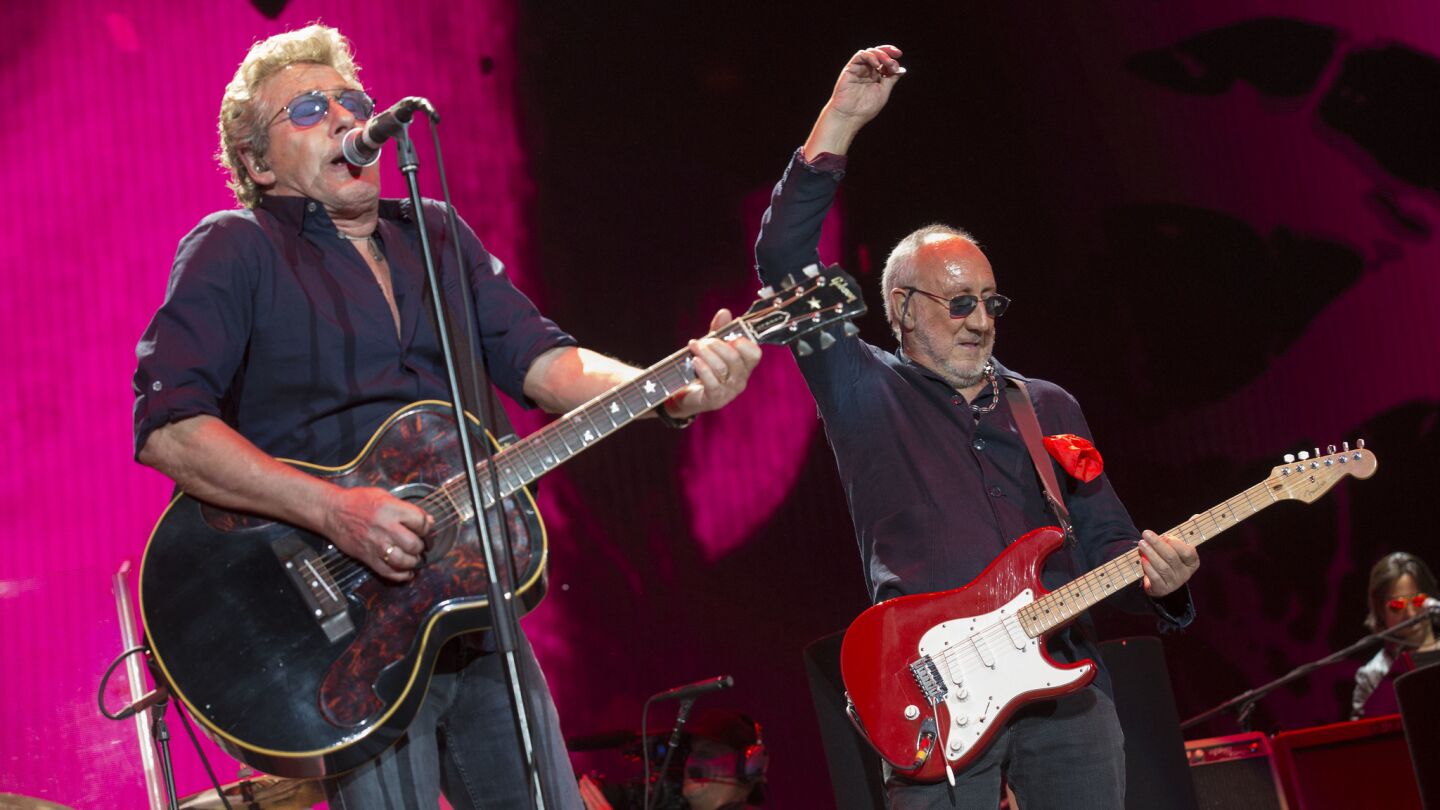 The Who's Roger Daltrey, left, and Pete Townshend, right, on stage at Desert Trip.