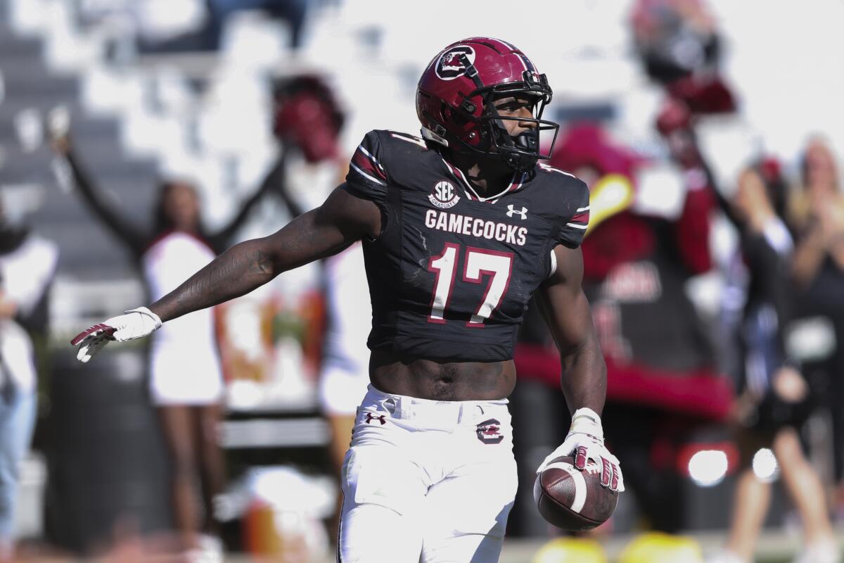 South Carolina wide receiver Xavier Legette (17) looks for  teammates after his 65-yard touchdown reception.
