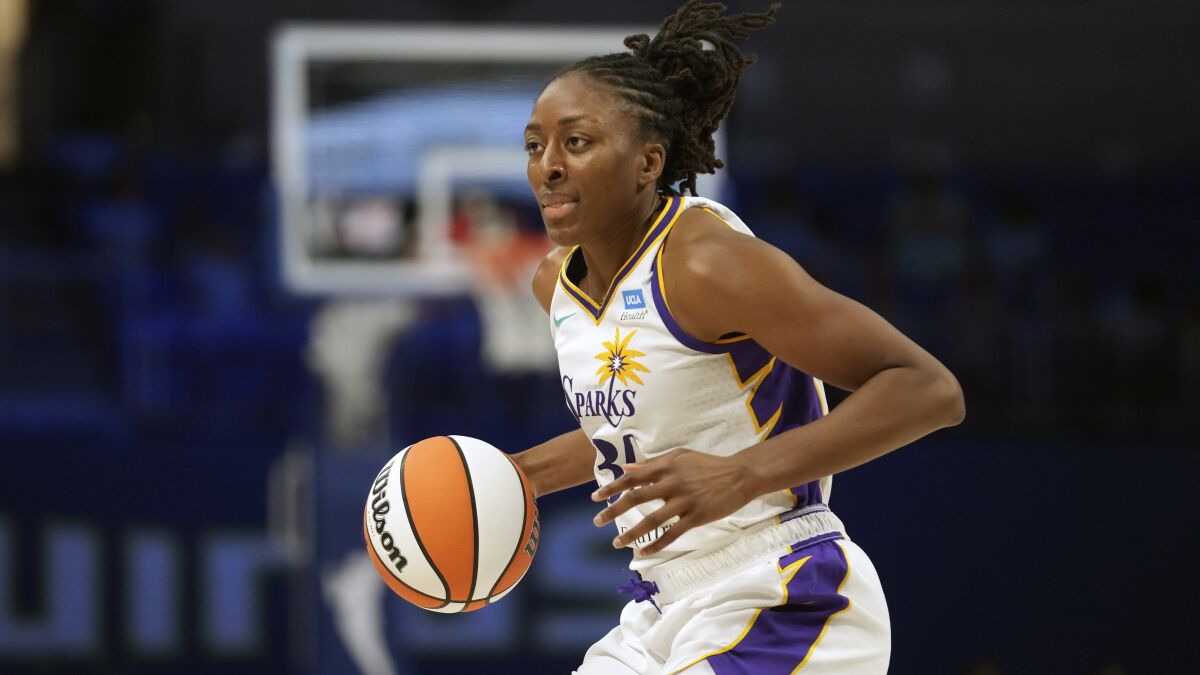 Los Angeles Sparks forward Nneka Ogwumike dribbles during the second half of a WNBA basketball.