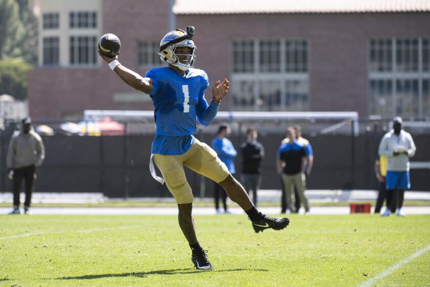 UCLA quarterback Dorian Thompson-Robinson throws during the Bruins' spring showcase at Drake Stadium on April 23, 2022.