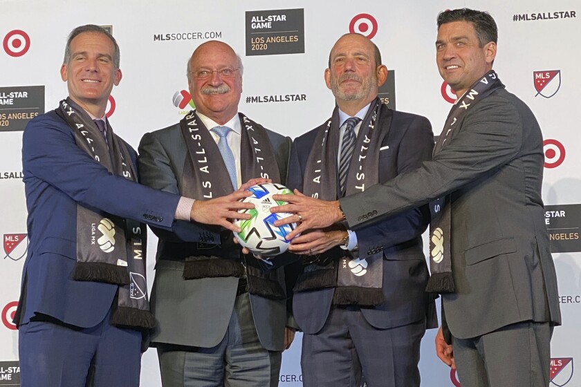 Los Angeles Mayor Eric Garcetti, from left, LIGA MX executive president Enrique Bonilla, Major League Soccer commissioner Don Garber and LAFC president Tom Penn announce that the MLS 2020 All-Star soccer game will be held in Los Angeles during a news conference Nov. 20 at Banc of California Stadium.
