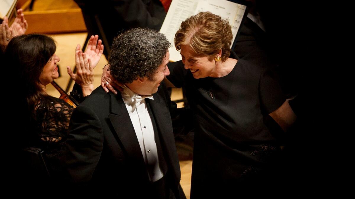 Deborah Borda shares a moment with Gustavo Dudamel during a farewell tribute to her in May 2017 at Disney Hall.