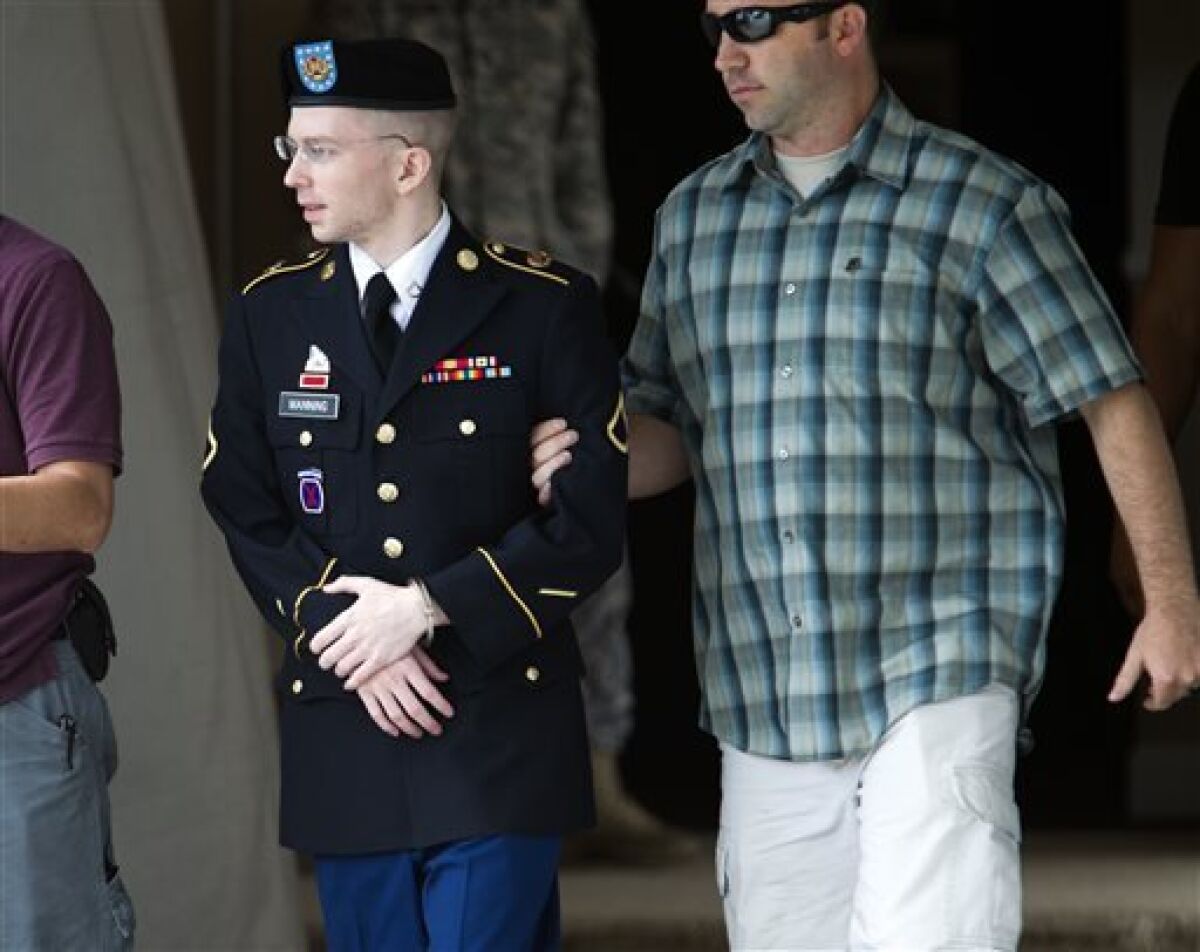 FILE - In this Friday, June 28, 2013 file photo, Army Pfc. Bradley Manning is escorted out of a courthouse in Fort Meade, Md., after another day of his court-martial, as he is charged with indirectly aiding the enemy by sending troves of classified material to WikiLeaks. Al-Qaida leaders reveled in WikiLeaks' publication of reams of classified U.S. documents, urging members to study them before devising ways to attack the United States, according to evidence presented by the prosecution Monday,