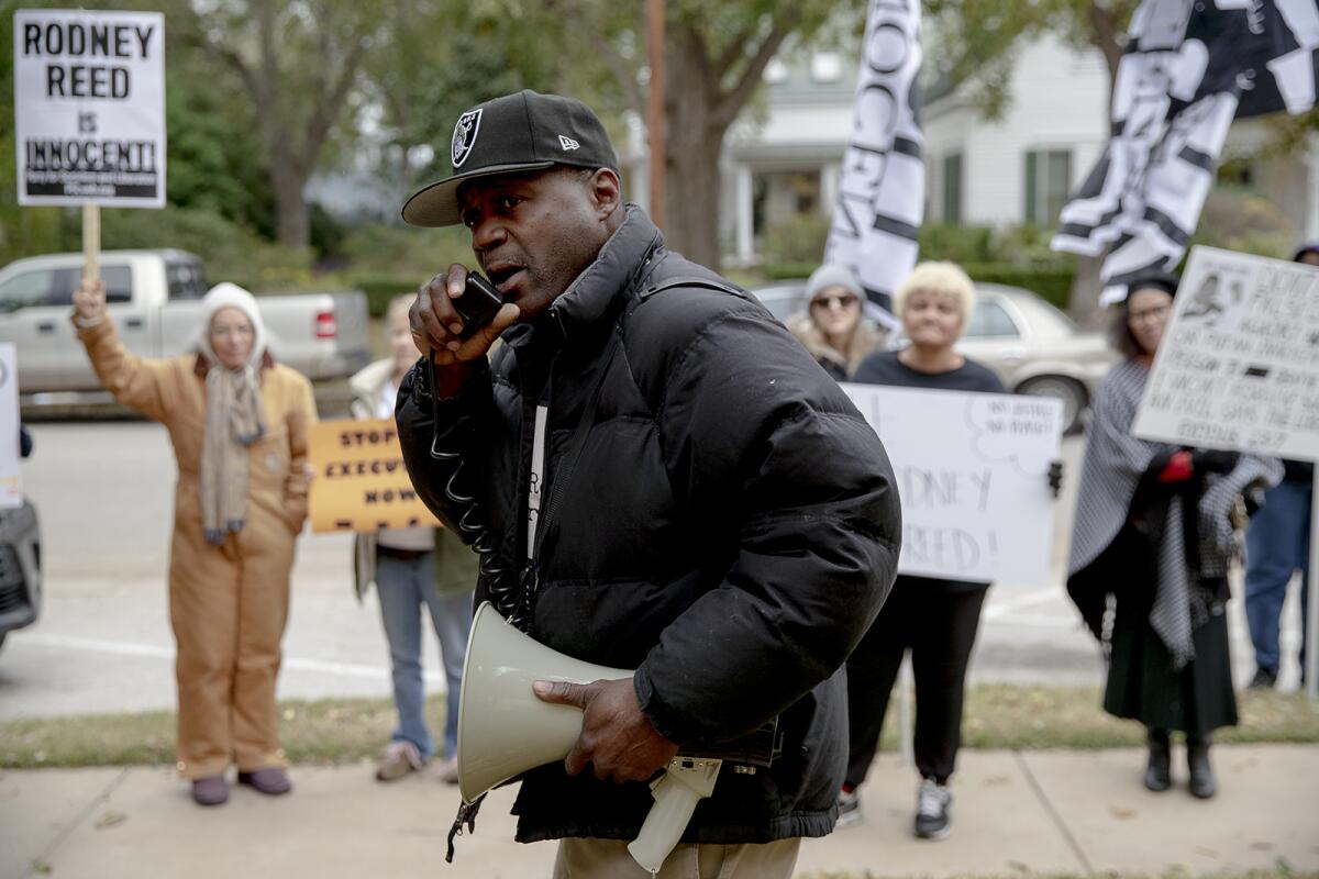 Rodrick Reed leads a chant during a protest against the execution of his brother Rodney Reed.