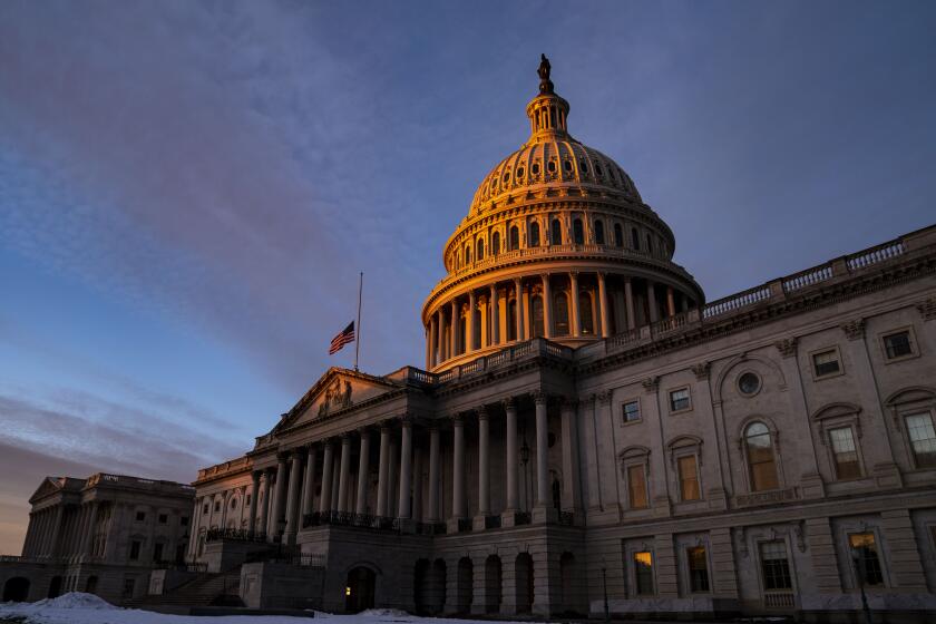 WASHINGTON, DC - JANUARY 06: The dome of the U.S. Capitol Building is illuminated by the rising sun on Capitol Hill on Thursday, Jan. 6, 2022 in Washington, DC. A year ago, an insurrectionist mob stormed the U.S. Capitol Building in hopes of interrupting the certification of the election of Joe Biden as the 46th President of the United States. (Kent Nishimura / Los Angeles Times)