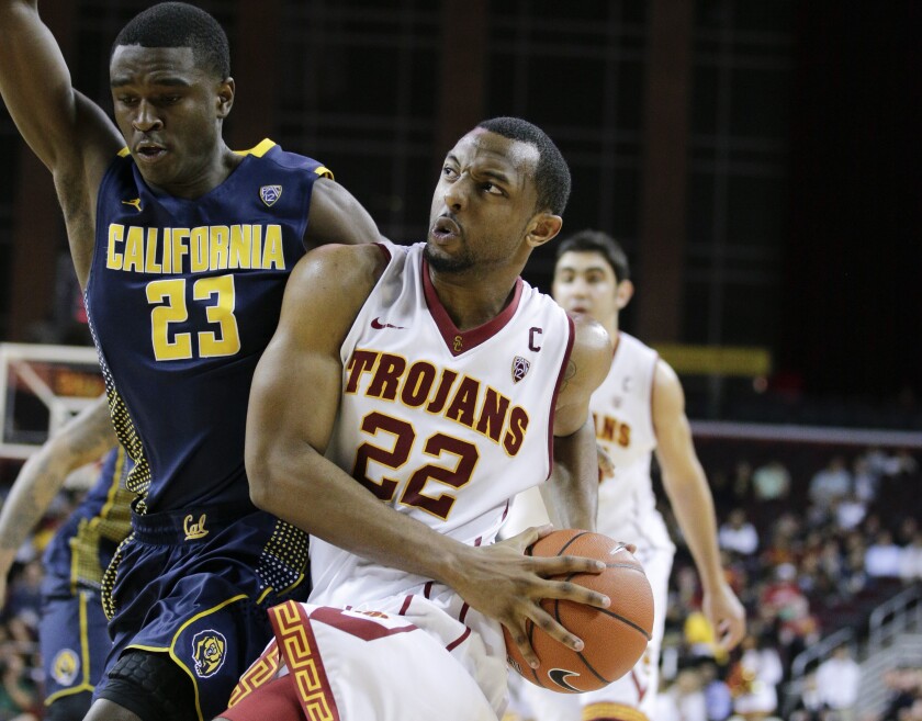 USC's Byron Wesley drives to the basket against California's Jabari Bird during a game in January 2014.