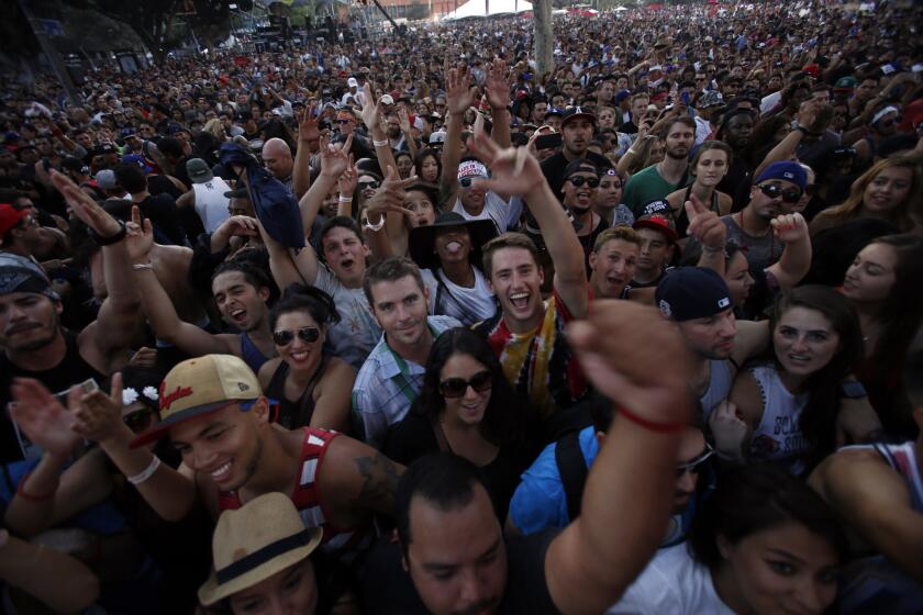 The crowd reacts as Sublime with Rome plays on the Dylan stage during the Made in America festival, in Los Angeles on August 30, 2014.