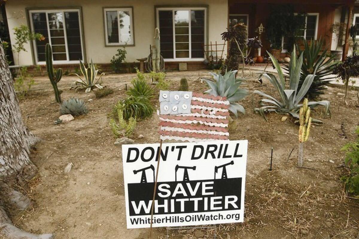 A sign at a home next to Whittier's nature preserve protests the oil drilling plans.