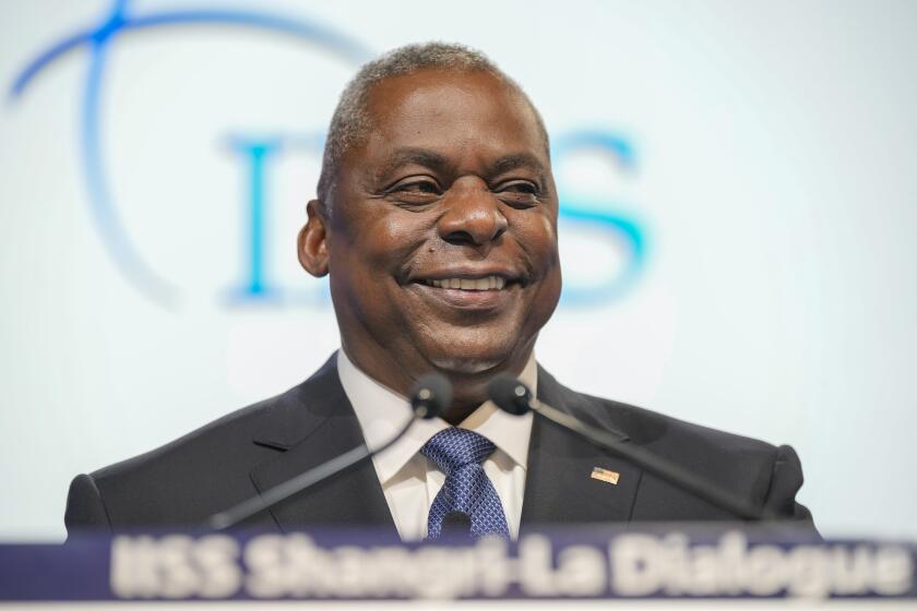 U.S. Secretary of Defense Lloyd J. Austin III smiles as he speaks during the 20th International Institute for Strategic Studies (IISS) Shangri-La Dialogue, Asia's annual defense and security forum in Singapore, Saturday, June 3, 2023. (AP Photo/Vincent Thian)