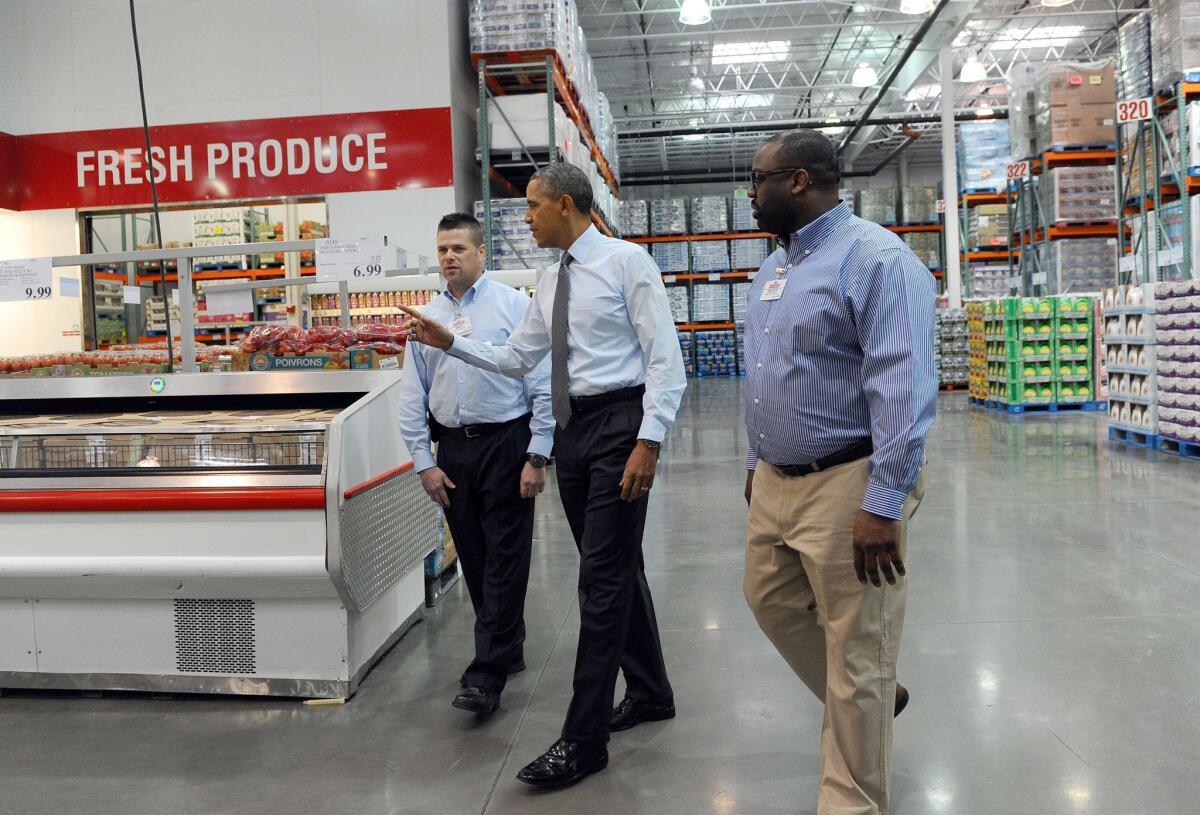 President Obama tours the Costco store in Lanham, Md., before speaking about the importance of raising the federal minimum wage.