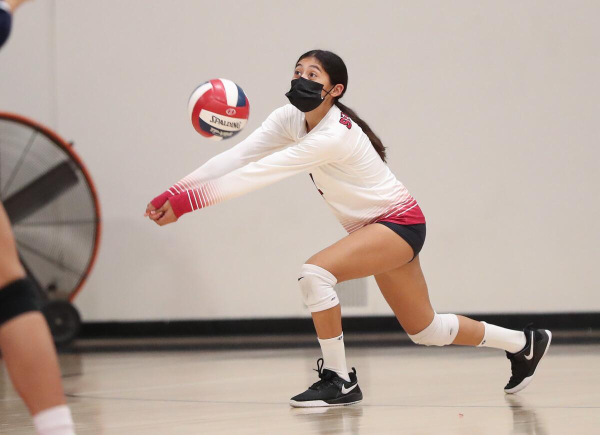 Ocean View's Isabel Escuro digs a ball in the first round of the Division 6 playoffs against Bolsa Grande on Wednesday.