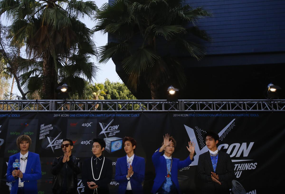 The singing group Teen Top talks to a crowd of fans during an exclusive meet and greet prior to the show.