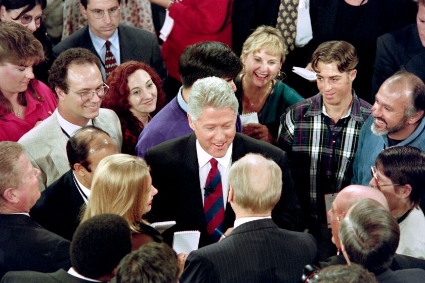 US President Bill Clinton answers questions on October 16, 1996 during an election rally in San Diego. (Photo by Mike NELSON / AFP) (Photo by MIKE NELSON/AFP via Getty Images)