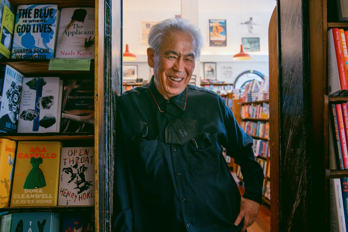 Paul Yamazaki poses for a portrait at City Lights Bookstore in San Francisco on August 17, 2023.