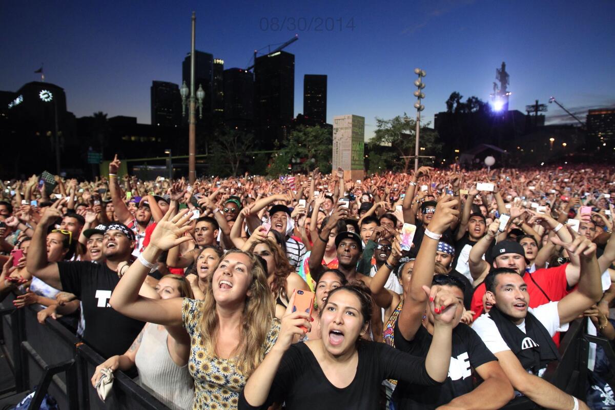 The crowd grooves as Kendrick Lamar performs at the Made in America festival over Labor Day weekend at Grand Park in downtown Los Angeles.