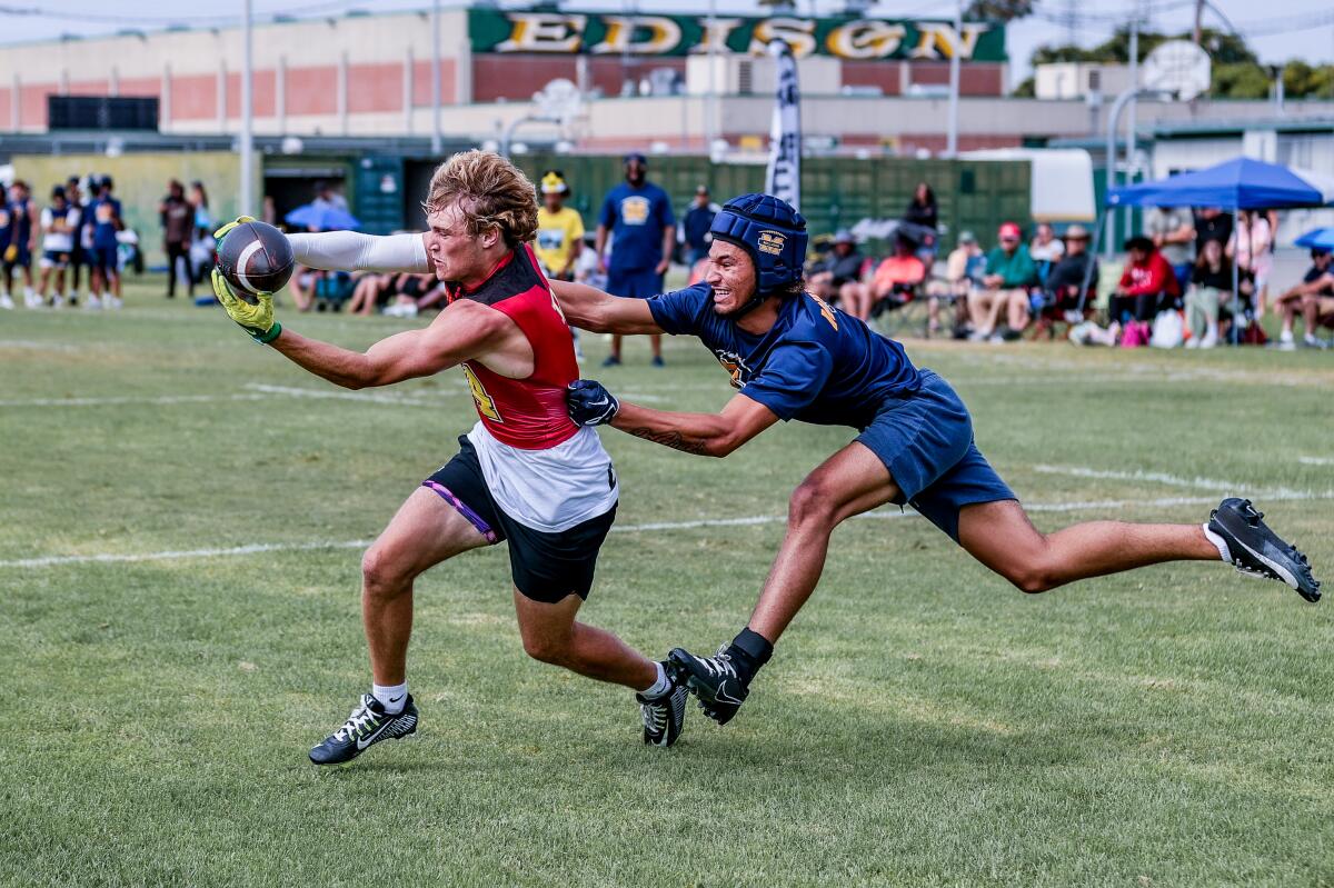 Mission Viejo receiver Vance Spafford catches pass at the Edison passing tournament.