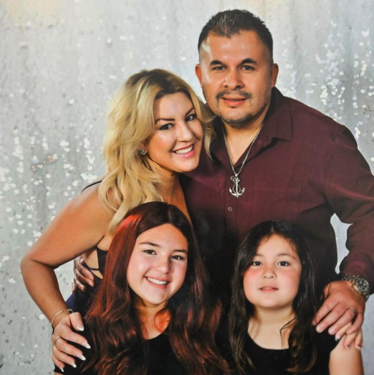 Deputy Arturo Atilano Valadez, who died by suicide in November, and his family.