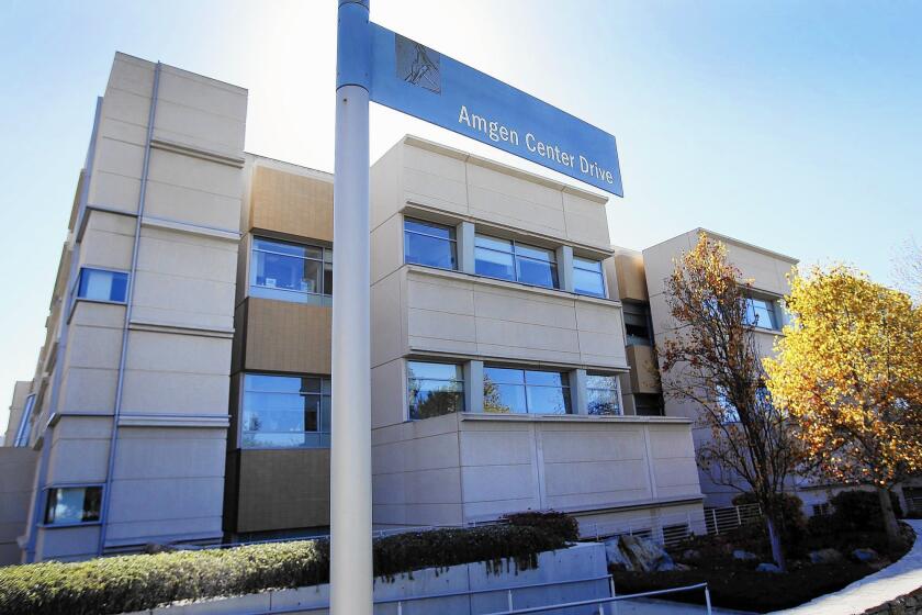 Amgen Inc. said Tuesday it will eliminate up to 1,100 additional jobs next year as the firm faces pressure to split into two.
