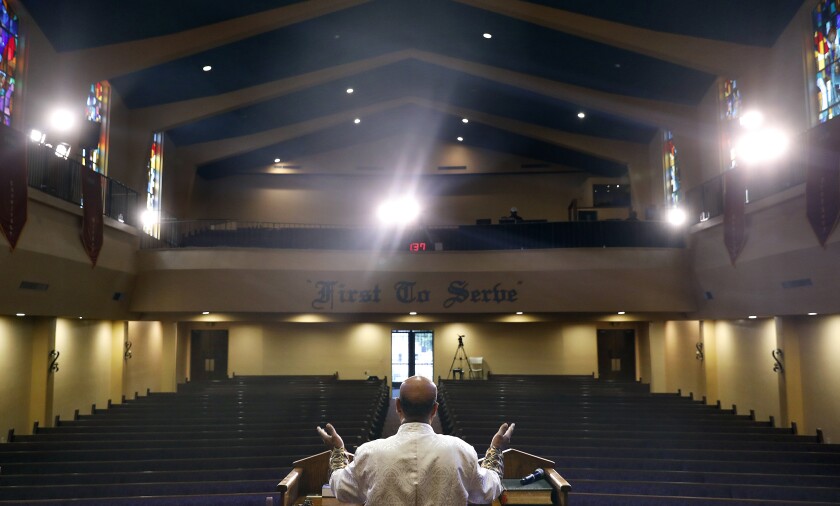 Pastor J. Edgar Boyd records a message for members of First A.M.E. church in L.A. last month during the coronavirus shutdown.