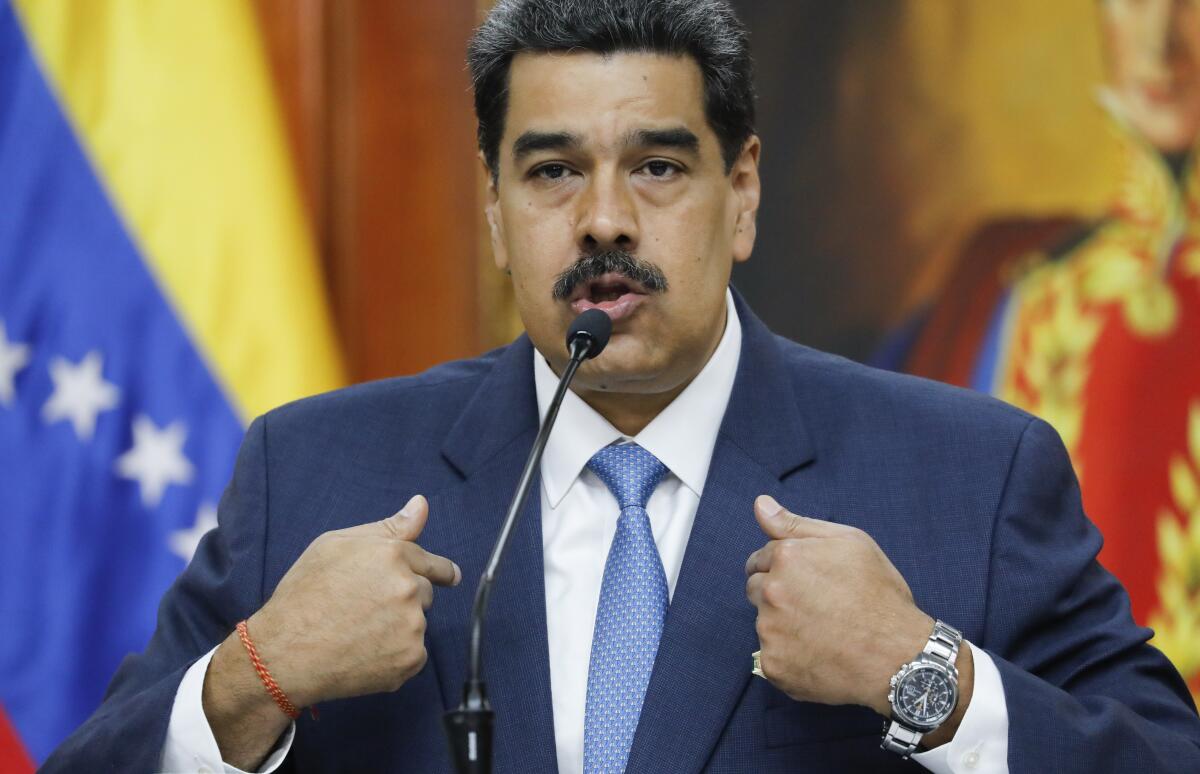 Venezuelan President Nicolas Maduro gives a press conference at Miraflores presidential palace in Caracas