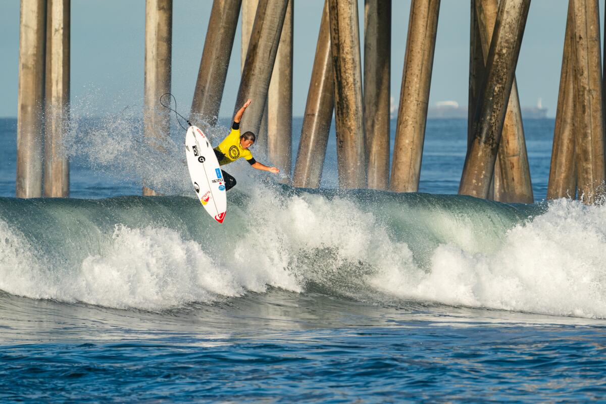 Hometown hero Kanoa Igarashi gets some air Tuesday during the ISA World Surfing Games in Huntington Beach.