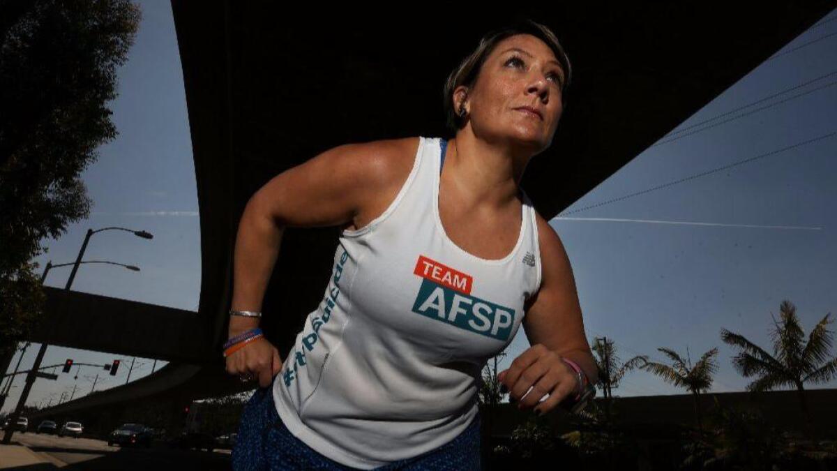Amy Robinson will run in the L.A. Marathon on Sunday, the eighth marathon in which she's competed in the last three years. Robinson has used running to help combat depression.