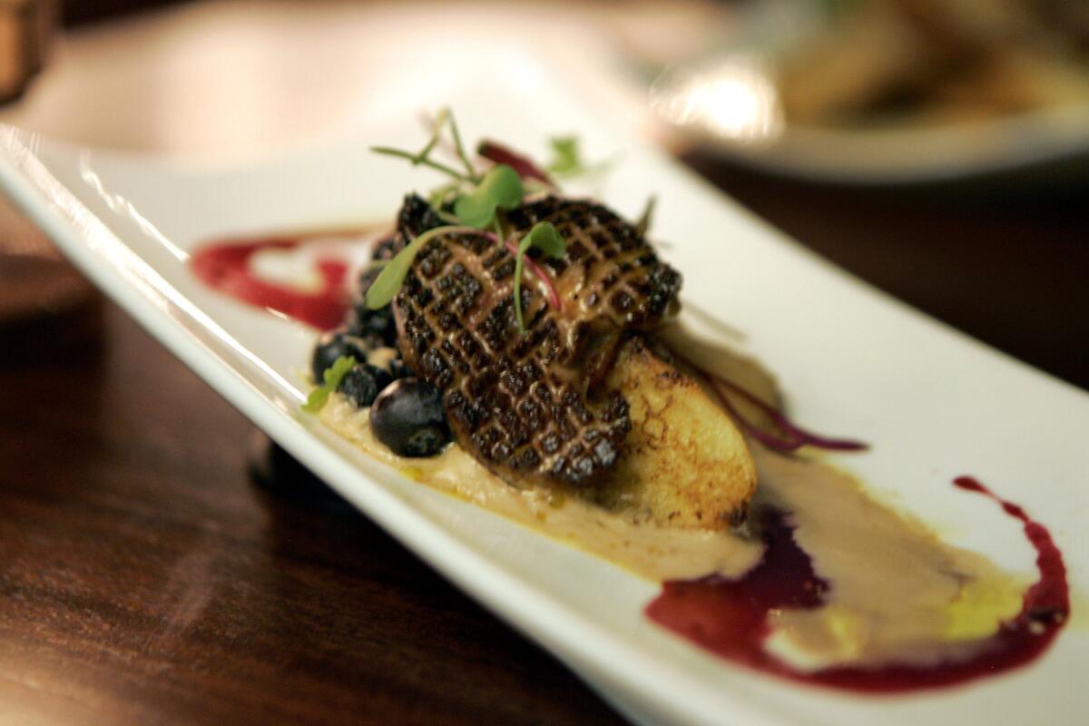 Seared foie gras with wild berry and mocha moose.