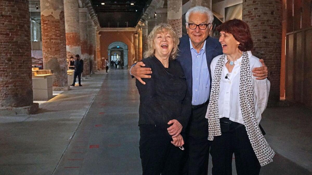 Yvonne Farrell, left, and Shelley McNamara, right, with Venice Architecture Biennale president Paolo Baratta at the Corderie.