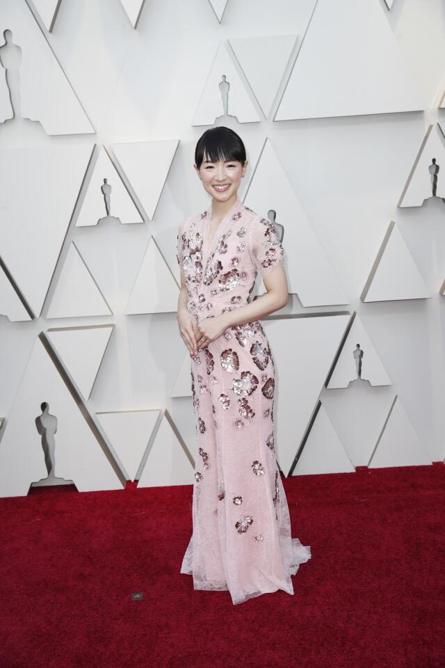 MISS: Marie Kondo could use a little coaching on the consolidation of patterns and colors in this Jenny Packham gown.