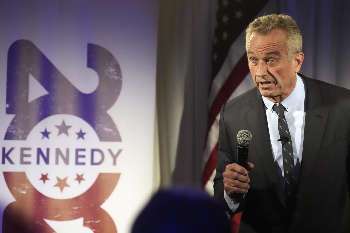 Independent presidential candidate Robert F. Kennedy Jr. holding a microphone and speaking during a campaign event.