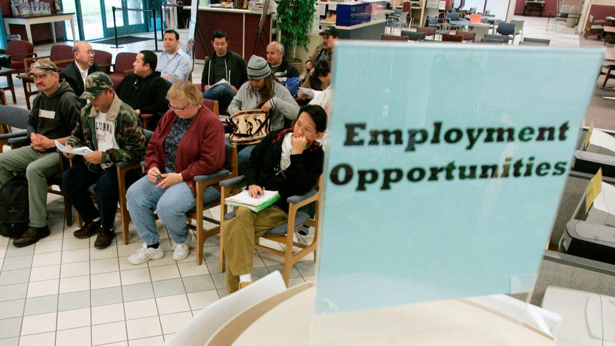 Job seekers at a state Employment Development Department office in San Jose, Calif. California's unemployment insurance fund has been insolvent, and borrowing money from the federal government, since 2009.