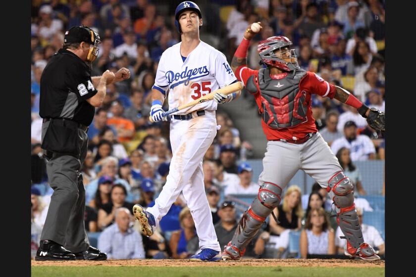 Dodgers Cody Bellinger strikes out against the Angels in the 6th inning.