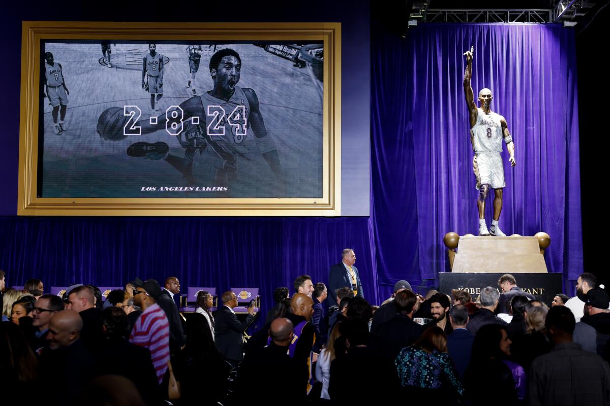 A statue of Kobe Bryant is unveiled during a ceremony outside Crypto.com Arena on Thursday.
