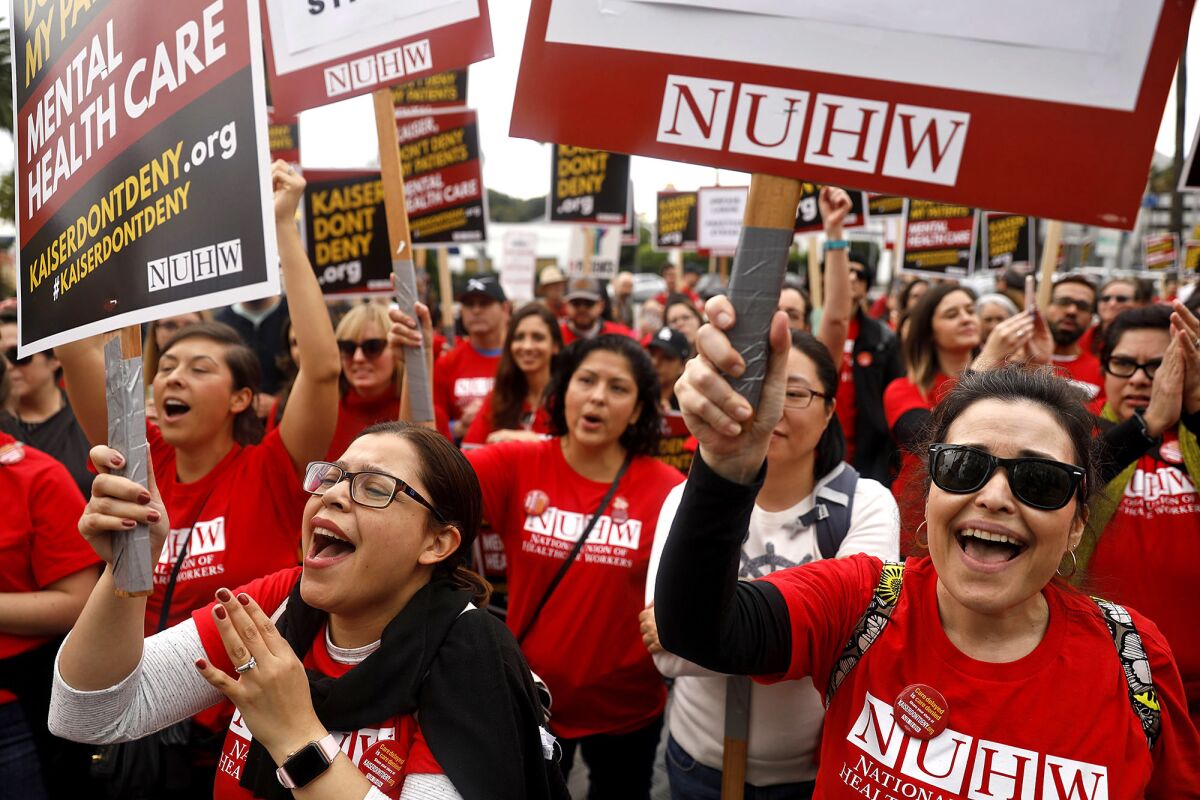 Mental health workers rally outside the Kaiser Permanente hospital on Sunset Boulevard in Los Angeles during a five-day strike in December 2018.