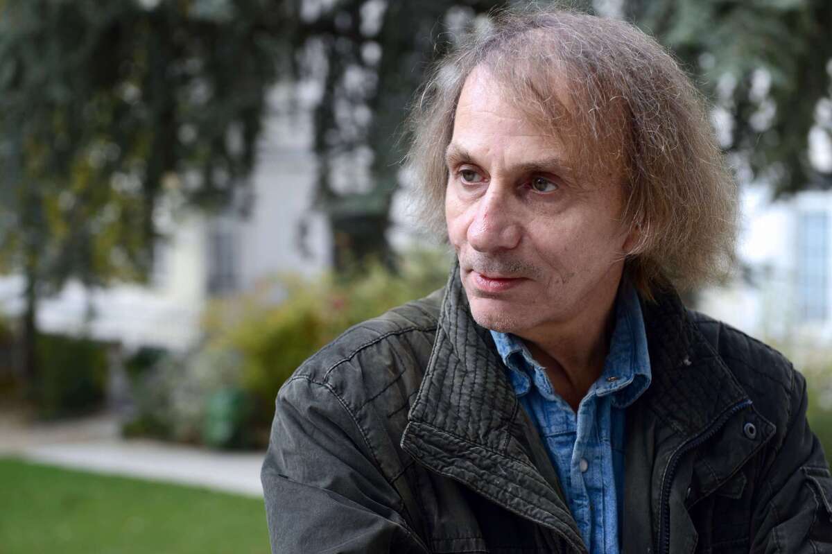 French writer Michel Houellebecq posing during his photo exhibition "Before Landing" at the Pavillon Carre de Baudouin in Paris.