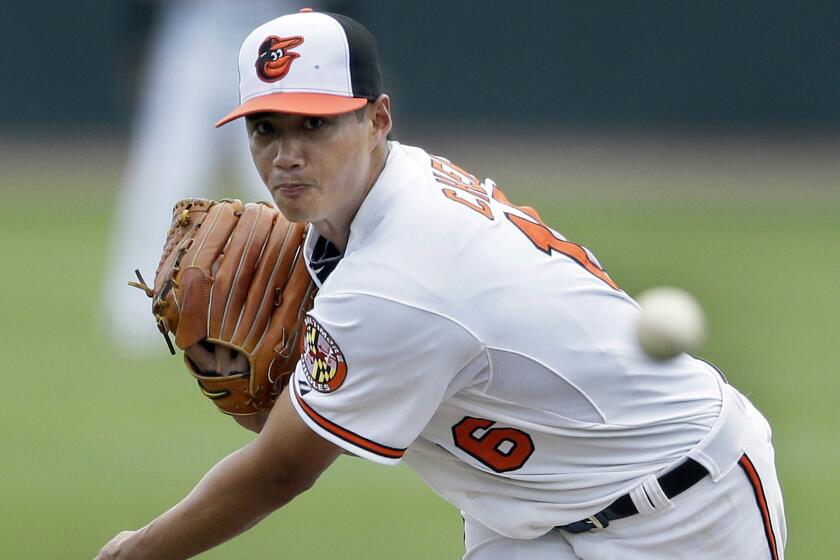 Baltimore Orioles starter Wei-Yin Chen delivers a pitch during an exhibition game against the New York Yankees on March 10.