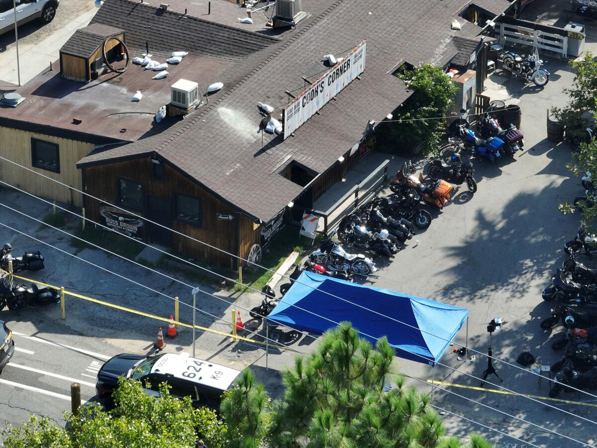 An aerial view of Cook's Corner with investigators outside