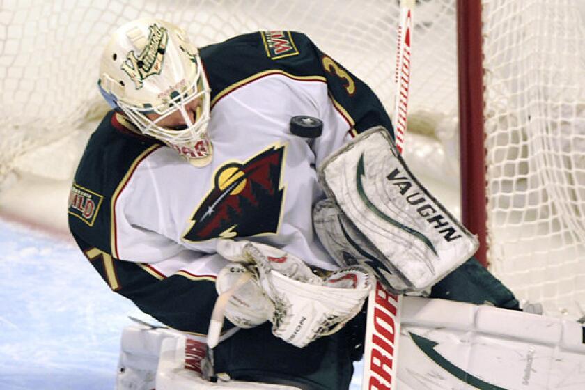 Minnesota Wild goalie Josh Harding stops a shot during the opening round of the Stanley Cup playoffs against the Chicago Blackhawks in April. Harding won the NHL's Masterton Trophy on Friday.