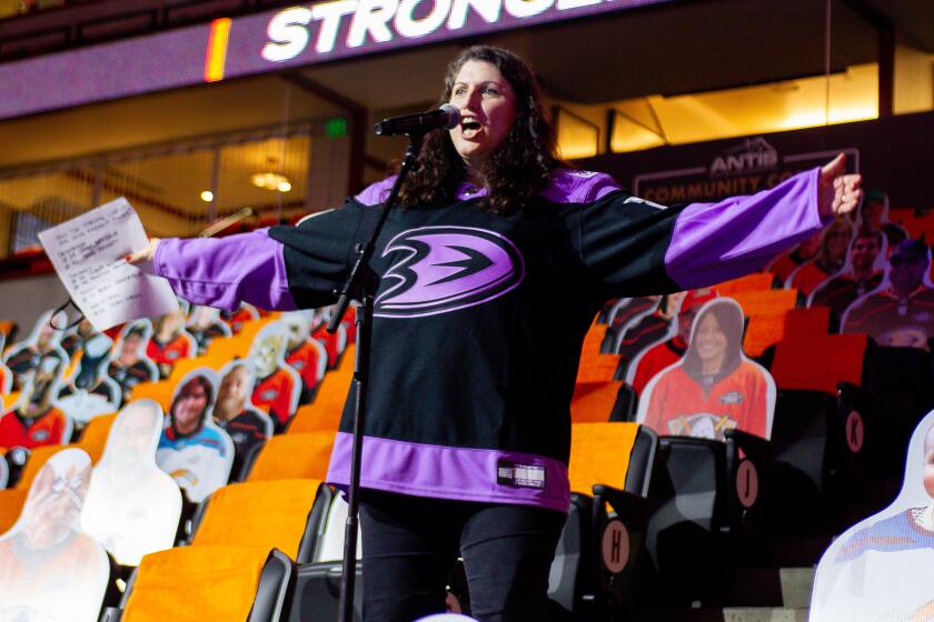 Angelique Fong introduces Ducks players before their against the Colorado Avalanche on April 11 at Honda Center.