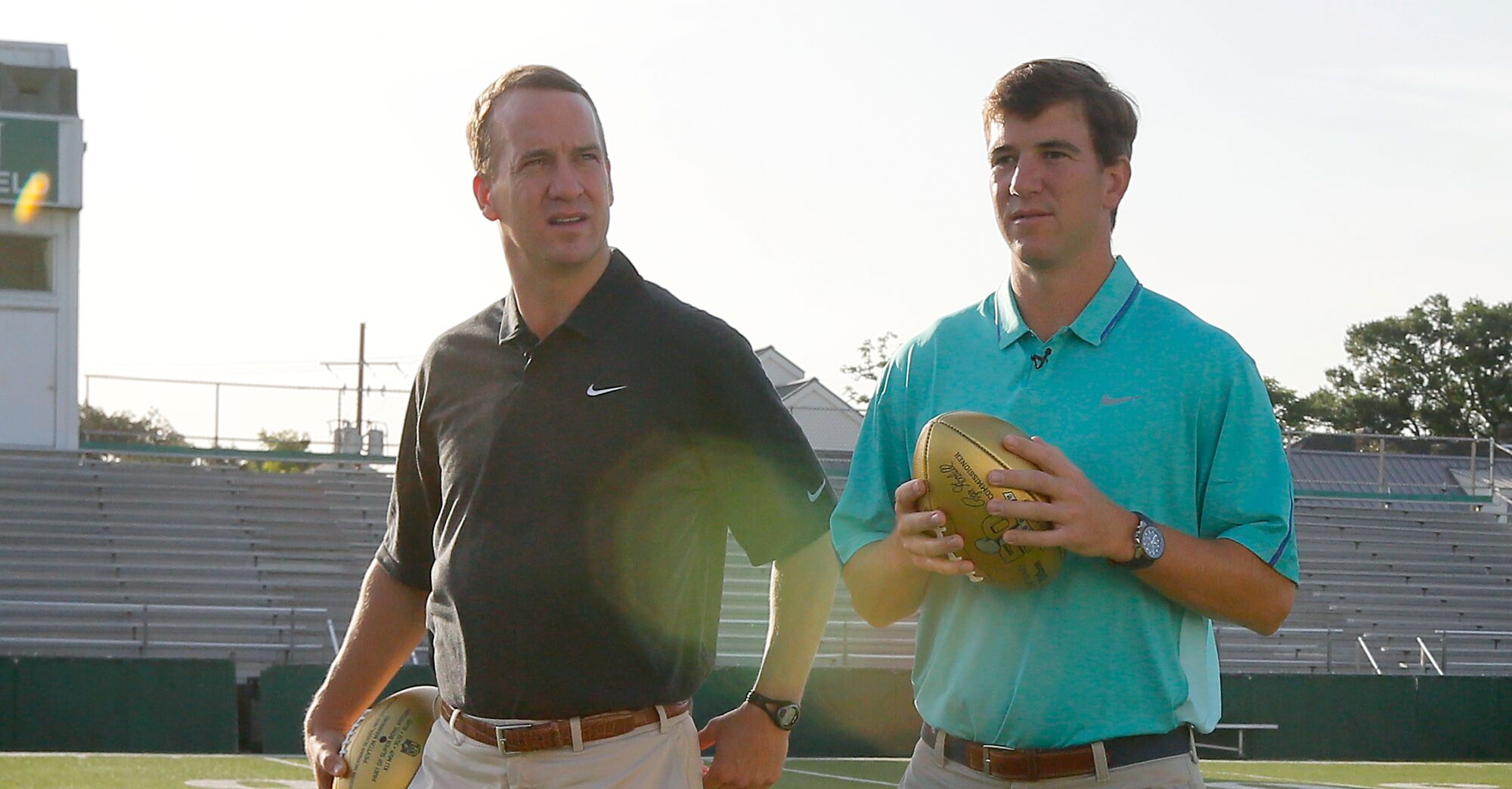 Payton (left) and Eli Manning don't often see each other in person during the NFL season.