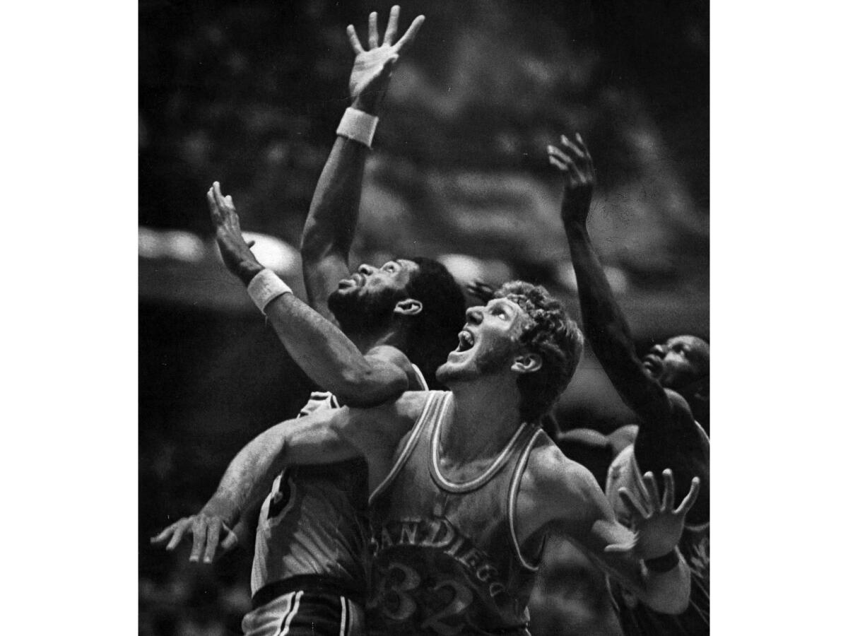 Sept. 27, 1979: Laker Kareem Abdul-Jabbar, left, and Clipper Bill Walton elbow for position during an exhibition game in Anaheim. This photo appeared in the Sept. 28, 1979, edition of The Times.