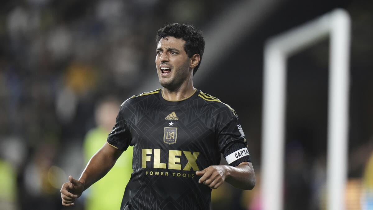 LAFC forward Carlos Vela runs on the field.